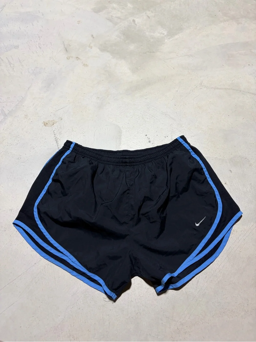 Nike women’s Black Running Shorts with Blue Trim medium